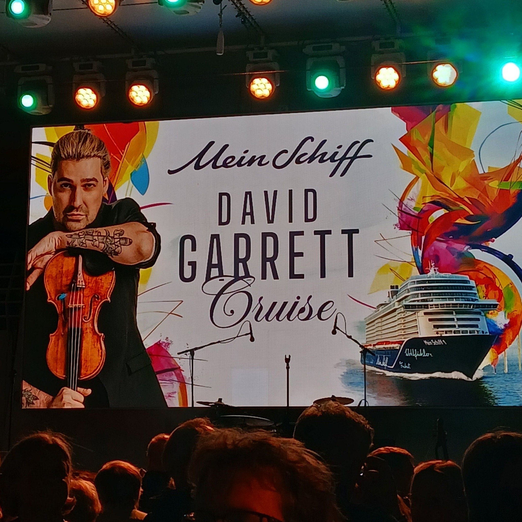 David Garrett Cruise on Mein Schiff 1, April 2026 — stage announcement, photo by Patrizia Antonelli