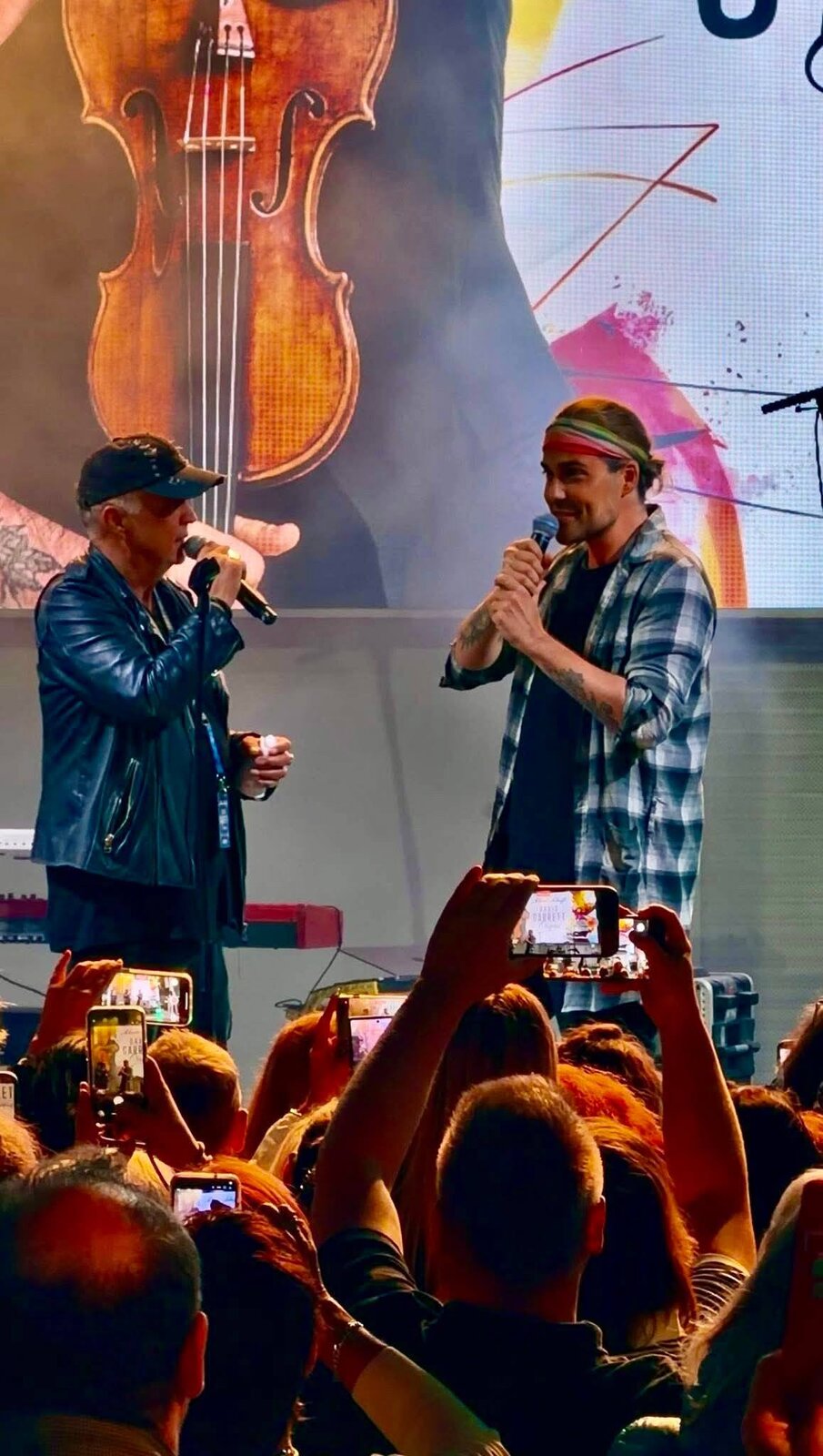 David and Jörg with microphones, fans capturing the moment &mdash; first concert, Mein Schiff 1, 29 April 2026