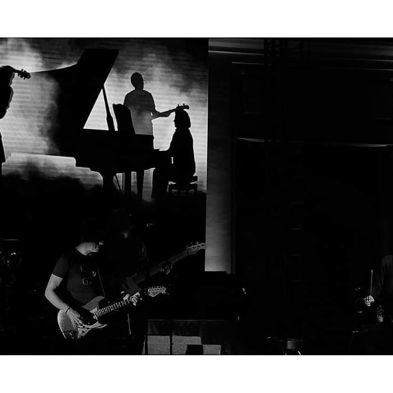 The Stage — wide shot, piano, guitar, smoke